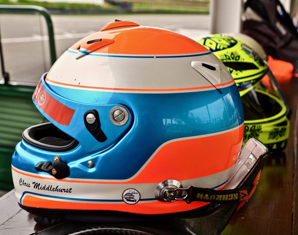 Chris Middlehurst's helmet, on the pit counter, during practice for the Goodwood 77th Members Meeting 2019. Photographed by Marcia White for Join The World Magazine.