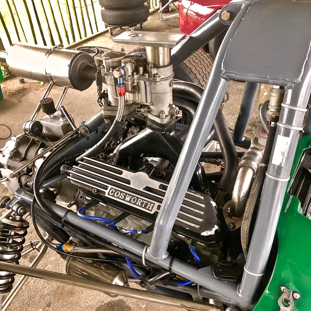 Formula 3, 1 litre, Cosworth engine fitted in the Tecno. In the paddock at Goodwood during practice for the 77MM.